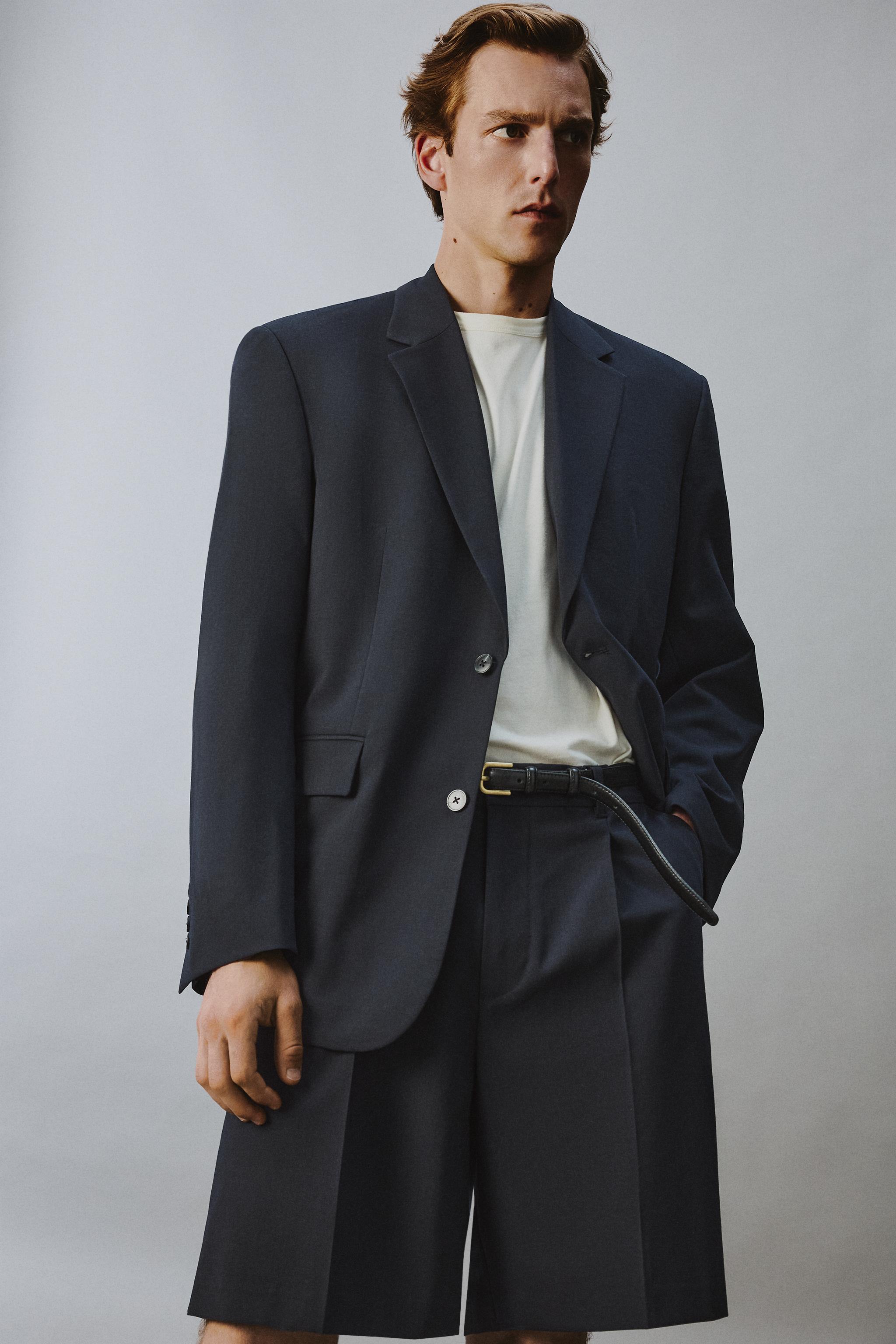 RELAXED FIT PLEATED SUIT SHORTS